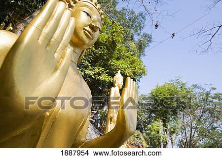 Buddha Statues On Phu Si Hill. View Large Photo Image Picture - Buddha Statues On Phu Si Hill.. Fotosearch