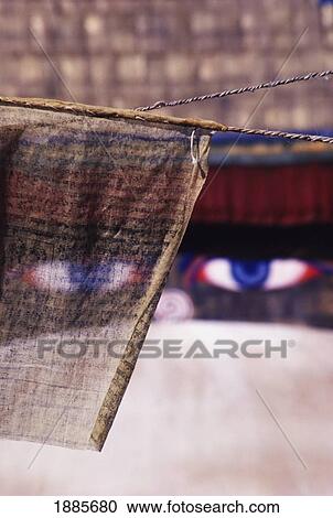 Stock Image - Buddha's Eyes And Prayer Flags, Close Up. Fotosearch