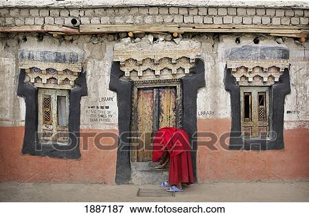 Buddhist Boy Monk Locks Up Door At Thikse Monastery View Large Photo Image Stock Photo - Buddhist Boy Monk Locks Up Door At Thikse Monastery. Fotosearch