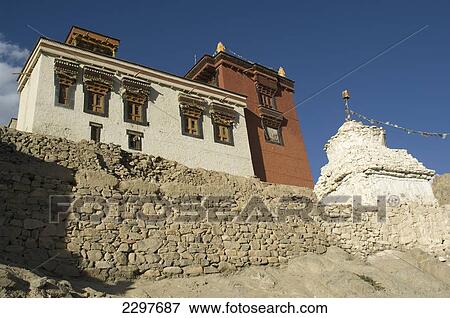 Stock Photo - Buddhist Gompa and chorten in Leh. Leh was the capital of the Himalayan kingdom of Ladakh, now the Leh District in the state of Jammu and Kashmir, India. Leh is at an altitude of 3, 500 meters (11, 483 ft).. Fotosearch