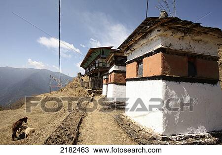 Stock Image - Buddhist Monastery And Prayer Flags, Above The Paro Valley, Bhutan. Fotosearch