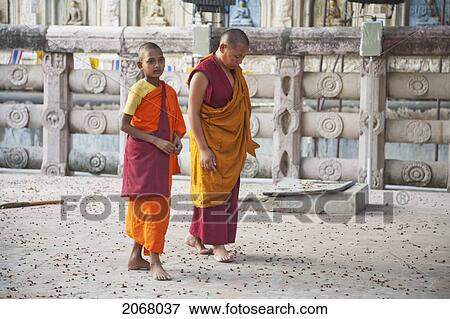 Buddhist Monk And Young Novice, Mahabodi Temple, Bodhgaya, Bihar, India View Large Photo Image Stock Photo - Buddhist Monk And Young Novice, Mahabodi Temple, Bodhgaya, Bihar, India. Fotosearch