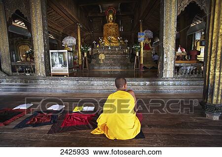 Buddhist monk at a monastery on Inle Lake; Myanmar View Large Photo Image Stock Image - Buddhist monk at a monastery on Inle Lake; Myanmar. Fotosearch