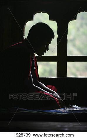 Buddhist Monk Boy Reciting Mantras View Large Photo Image Stock Photo - Buddhist Monk Boy Reciting Mantras. Fotosearch