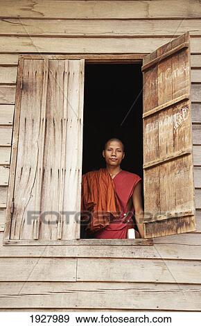 Buddhist Monk In Window View Large Photo Image Stock Photo - Buddhist Monk In Window. Fotosearch