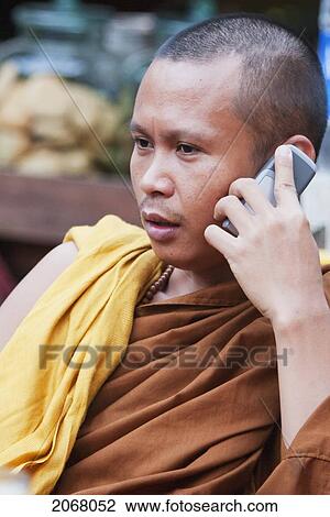 Buddhist Monk On The Phone, Bodhgaya, Bihar, India View Large Photo Image Stock Image - Buddhist Monk On The Phone, Bodhgaya, Bihar, India. Fotosearch