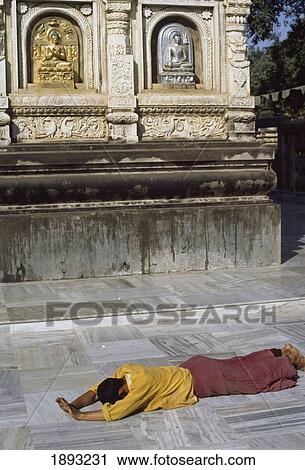 Stock Image - Buddhist Monk Prostrated. Fotosearch