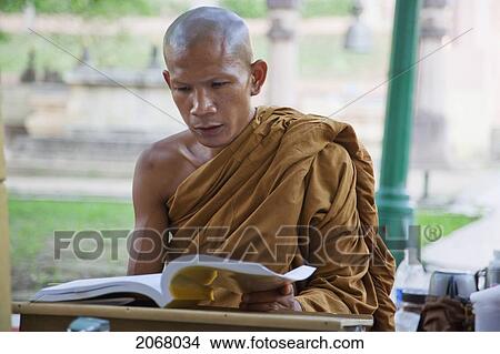 Buddhist Monk Reciting By The Bodhi Tree, Mahabodi Temple, Bodhgaya, Bihar, India View Large Photo Image Picture - Buddhist Monk Reciting By The Bodhi Tree, Mahabodi Temple, Bodhgaya, Bihar, India. Fotosearch