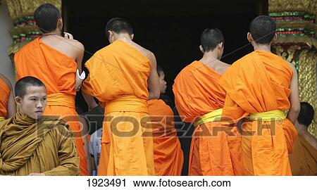 Buddhist Monks Praying Outside Temple, Luang Prabang, Laos View Large Photo Image Stock Image - Buddhist Monks Praying Outside Temple, Luang Prabang, Laos. Fotosearch