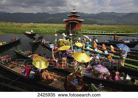 Stock Photography - Buddhist procession on Inle Lake; Myanmar. Fotosearch