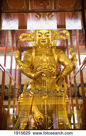 Stock Photo - Buddhist Statue In Sam Poh Tong Temple. Fotosearch