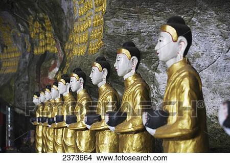 Picture - Buddhist statues in Saddar cave close to Hpa-An; Kayin State, Burma. Fotosearch