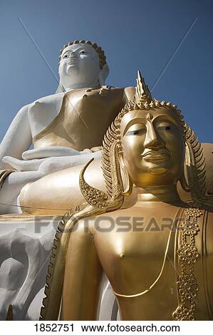Buddhist Statues, Wat Phrathat Doi Kham Temple; Chiang Mai, Thailand View Large Photo Image Stock Image - Buddhist Statues, Wat Phrathat Doi Kham Temple; Chiang Mai, Thailand. Fotosearch
