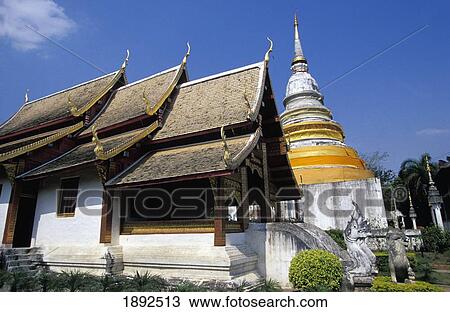 Stock Image - Buddhist Temple Phra Singh With Wat Wiharn Lai Kam. Fotosearch