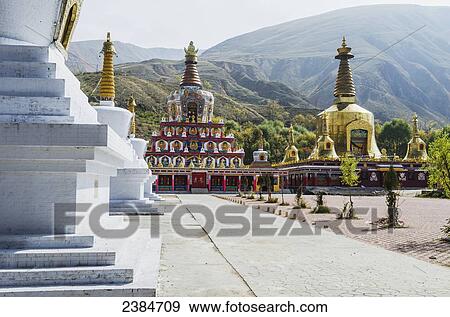 Stock Photo - Buddhist temples (stupas) at Wutun Si monastery; Tibet, China. Fotosearch
