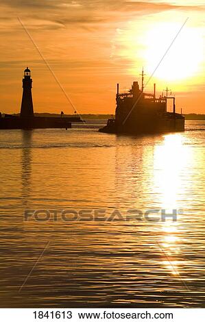 Buffalo Lighthouse And Cement Carrier In Buffalo Port At Sunset; Buffalo, New York State, Usa View Large Photo Image Stock Image - Buffalo Lighthouse And Cement Carrier In Buffalo Port At Sunset; Buffalo, New York State, Usa. Fotosearch