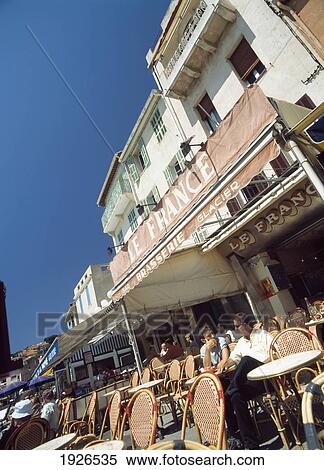 Building Exterior With Cafes View Large Photo Image Stock Photography - Building Exterior With Cafes. Fotosearch