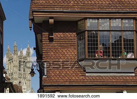 Stock Image - Building Exterior With Canterbury Cathedral In Background. Fotosearch