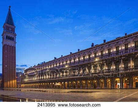 Stock Photography - Building in Piazza San Marco illuminated at dusk; Venice, Veneto, Italy. Fotosearch