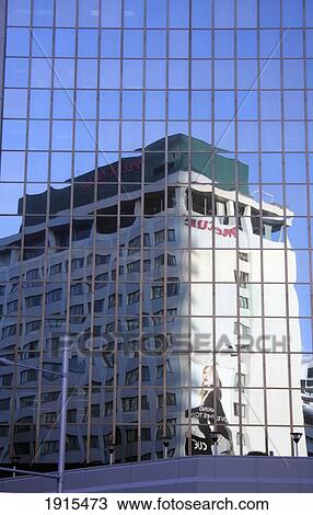 Stock Image - Building Reflection On Office Exterior On Queen Street. Fotosearch