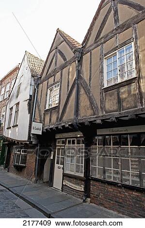 Building With Bars Covering The Window For Security; York England View Large Photo Image Stock Photo - Building With Bars Covering The Window For Security; York England. Fotosearch