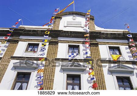 Stock Photo - Building With Colorful Flags. Fotosearch
