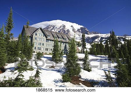 Stock Photography - Building With Mount Rainier In The Background; Mount Rainier National Park, Washington, Usa. Fotosearch