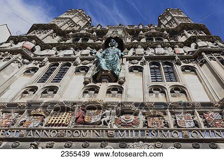 Building with sculptures of human figures around the facade; Canterbury, Kent, England View Large Photo Image Stock Photo - Building with sculptures of human figures around the facade; Canterbury, Kent, England. Fotosearch