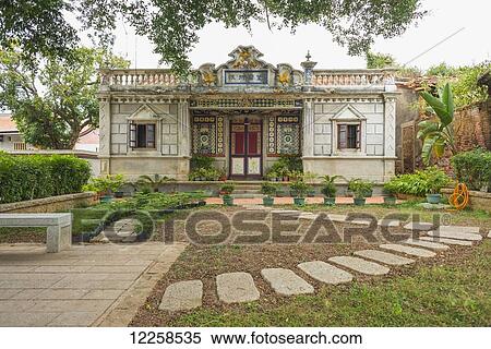 Stock Photography - Building with stepping stone path and colourful, ornate facade; Shuitou, Kinmen Island, Taiwan. Fotosearch