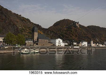 Stock Photography - Buildings Against Hill At Upper Middle Rhine Valley, Rhineland-Palatinate, Germany. Fotosearch