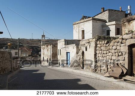 Stock Image - Buildings Along A Street With A Blue Sky; Ortahisar Nevsehir Turkey. Fotosearch