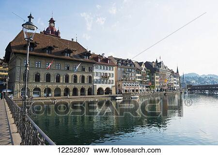 Stock Photo - Buildings along River Reuss; Lucerne, Switzlerland. Fotosearch