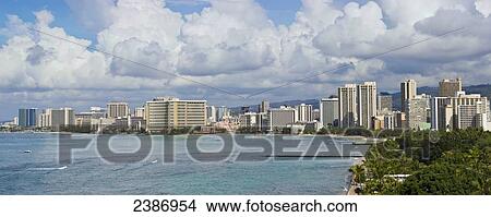 Buildings along the busy coastline; Honolulu, Oahu, Hawaii, United States of America View Large Photo Image Picture - Buildings along the busy coastline; Honolulu, Oahu, Hawaii, United States of America. Fotosearch