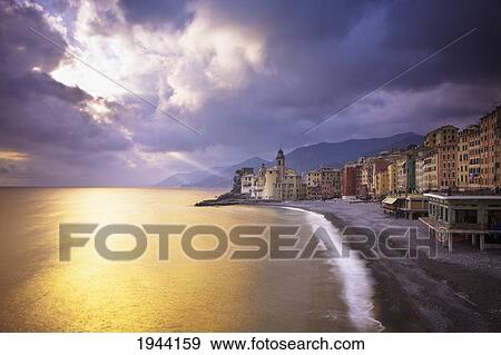 Buildings Along The Coast At Sunset; Camogli Liguria Italy View Large Photo Image Stock Photo - Buildings Along The Coast At Sunset; Camogli Liguria Italy. Fotosearch