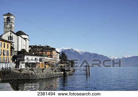 Picture - Buildings along the harbour of Lake Maggiore; Brissago, Ticino, Switzerland. Fotosearch