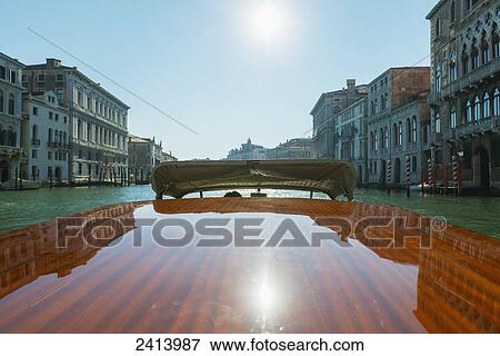 Stock Photo - Buildings along the shoreline of the Grand Canal viewed from a boat; Venice, Veneto, Italy. Fotosearch