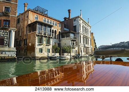 Stock Photo - Buildings along the shoreline of the Grand Canal viewed from a boat; Venice, Veneto, Italy. Fotosearch