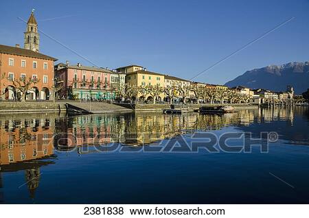 Buildings along the waterfront of a lake; Ascona, Ticino, Switzerland View Large Photo Image Stock Photo - Buildings along the waterfront of a lake; Ascona, Ticino, Switzerland. Fotosearch