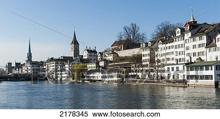 Stock Photography - Buildings Along The Water's Edge; Zurich Switzerland. Fotosearch