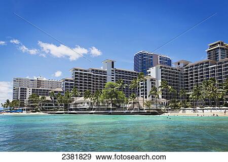 Stock Photo - Buildings and beaches along the coast; Honolulu, Ohau, Hawaii, United States of America. Fotosearch