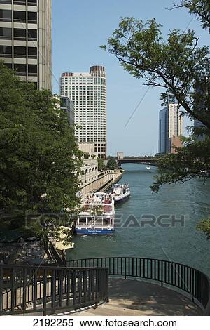 Stock Photography - Buildings And Boats Along The Chicago River; Chicago Illinois United States Of America. Fotosearch