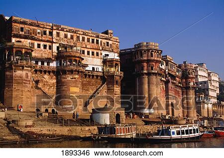 Stock Photograph - Buildings And Boats In Varanasi. Fotosearch