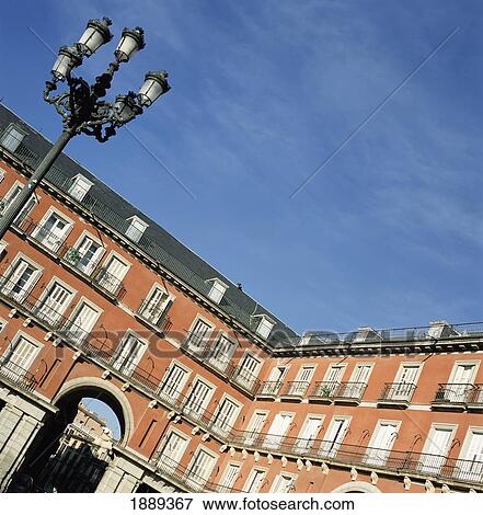 Stock Photo - Buildings And Lamp Post In Plaza Major. Fotosearch