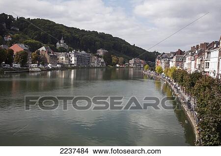 Picture - Buildings And Pedestrians Along The River Meuse; Dinant Namur Belgium. Fotosearch