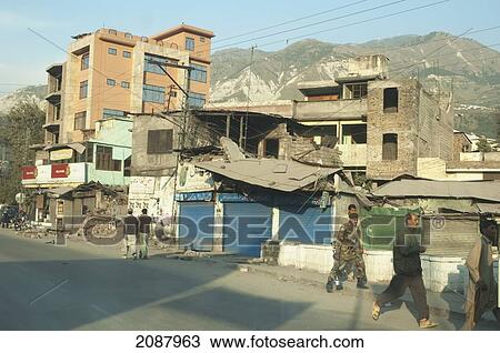 Stock Image - Buildings Damaged By The 8 October 2005 Earthquake, Muzaffarabad, Azad Kashmir, Pakistan. Fotosearch