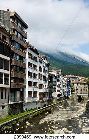 Stock Photo - Buildings In Front Of Urola River, Azkoitia, Basque Country, Spain. Fotosearch