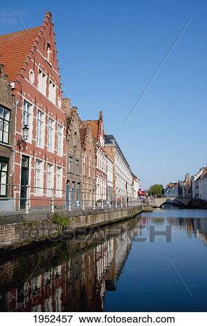 Buildings in the Hanseatic Quarter, as seen from a canal, Bruges (Brugge), West Flanders, Belgium View Large Photo Image Stock Photo - Buildings in the Hanseatic Quarter, as seen from a canal, Bruges (Brugge), West Flanders, Belgium. Fotosearch