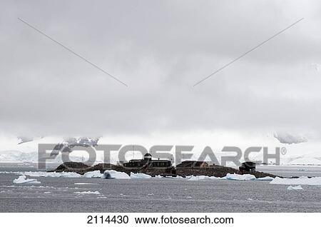 Stock Image - Buildings On An Island; South Shetland Islands Antarctica. Fotosearch