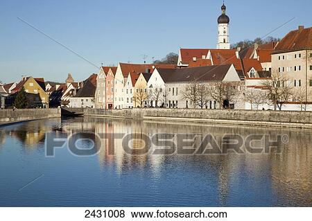Stock Photo - Buildings reflected in a tranquil river; Landsberg am Lech, Bavaria, Germany. Fotosearch