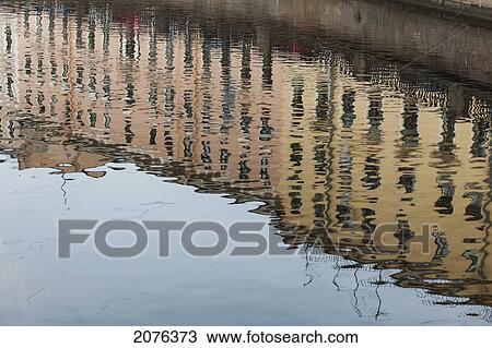Stock Image - Buildings Reflected In The Griboedova Canal; St. Petersburg Russia. Fotosearch